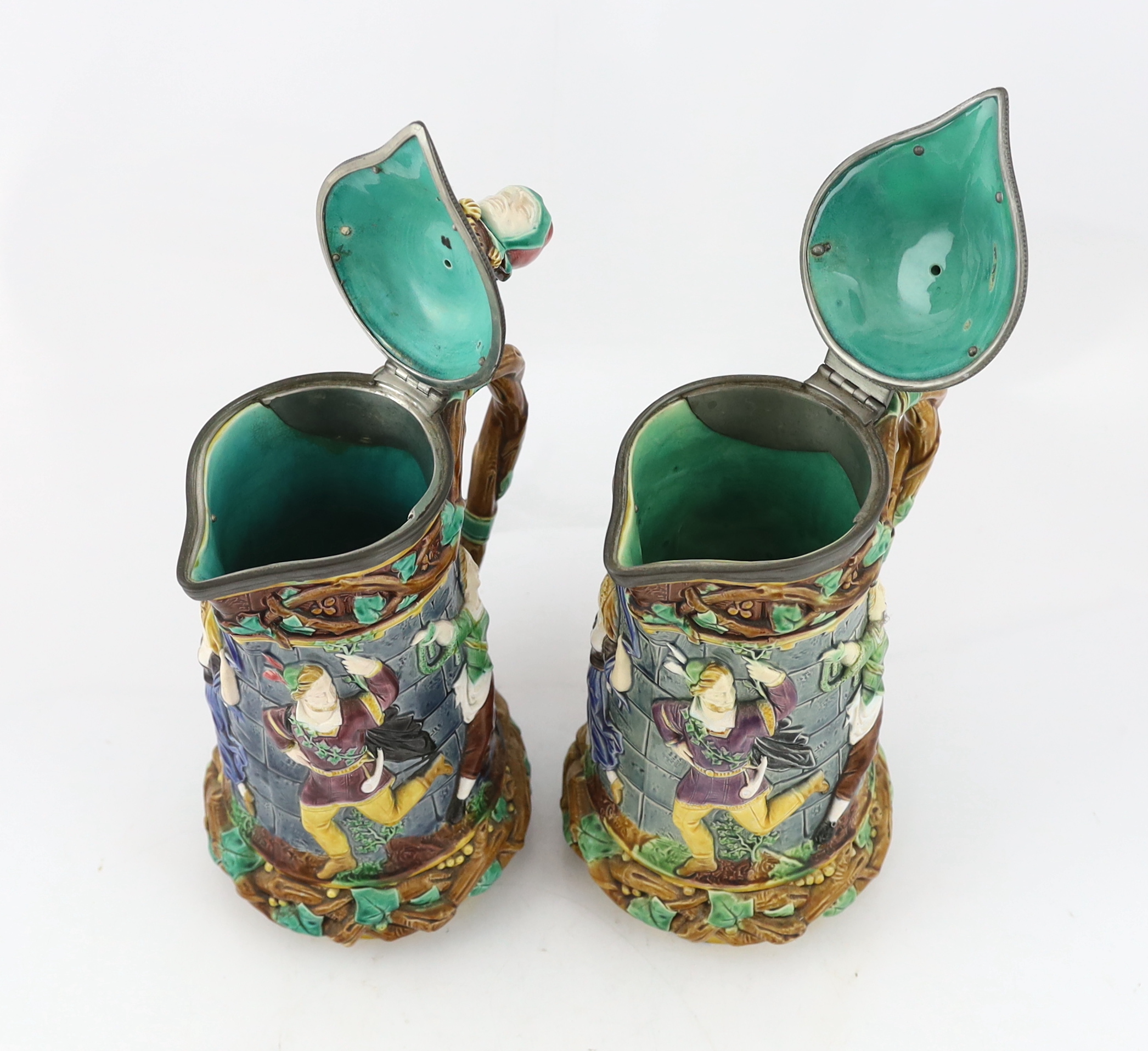 A pair of Victorian Minton majolica ‘Tower’ jugs, 33cm high